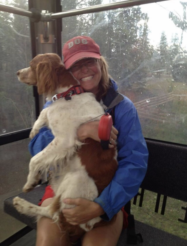 Sheila and Chance riding the gondola in Breckinridge